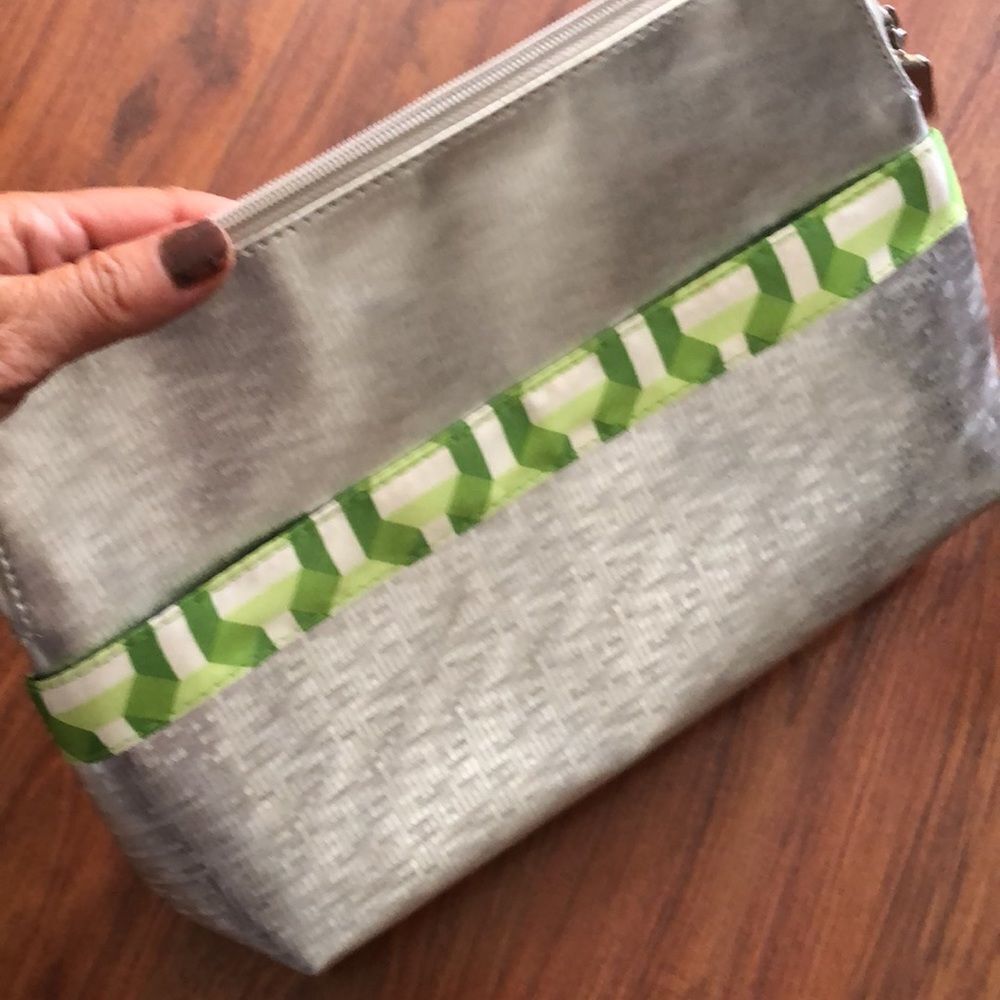 Clinique Silver and green large cosmetic bag.